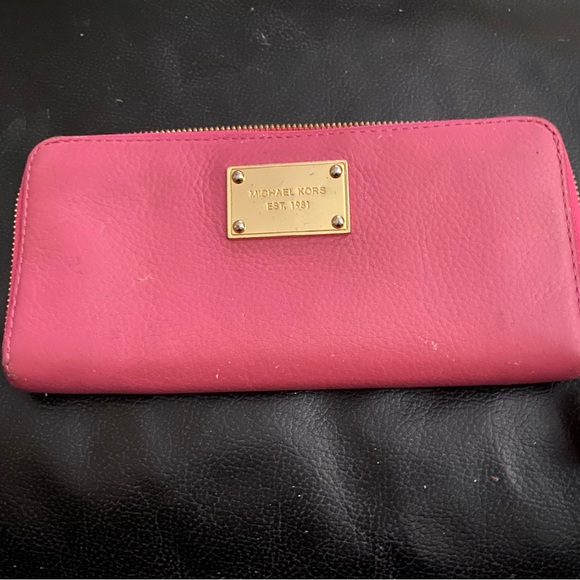 Michael Kors Handbags - Michael Kors large pink wallet beautiful slight wear on corners